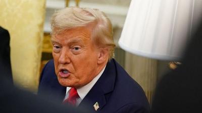 Trump talks in the White House.