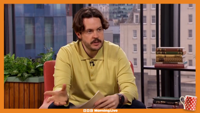 Nick Stapleton in the Morning Live studio wearing a light mustard yellow colour top