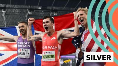 Neil Gourley, Jakob Ingebrigtsen and Luke Houser pose for pictures with their flags