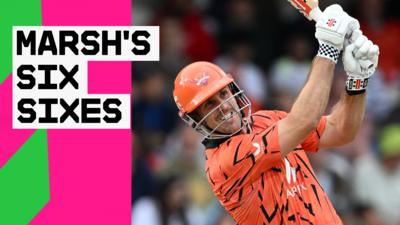 Mitch Marsh looks delighted as he strikes a six
