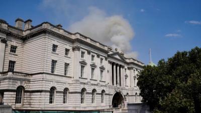 Smoke rising above Somerset House 