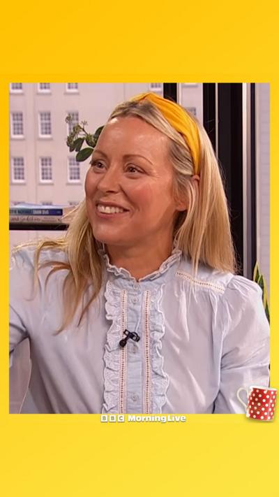 Anna Haugh in the morning live studio smiling, wearing a light blue blouse