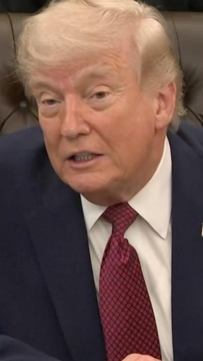 Trump sitting down and speaking from Oval Office