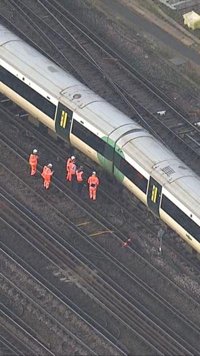 Aerial view of derailed train.