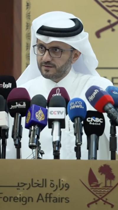 Qatar FM spokesperson speaking to press at conference