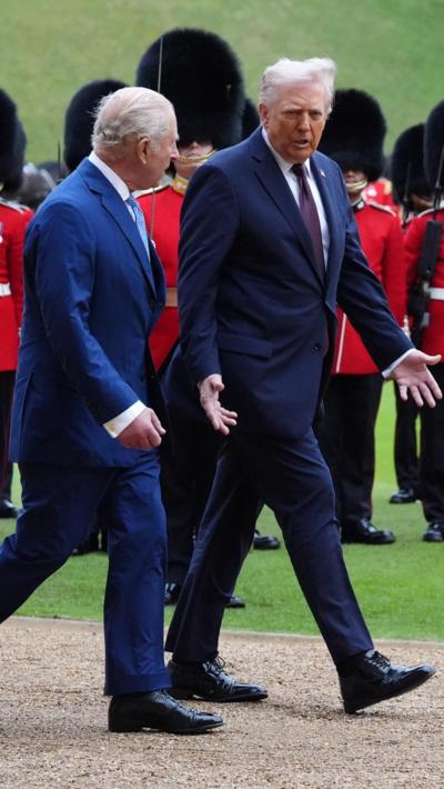 King Charles and President Trump with guard of honour during the ceremonial welcome at Windsor Castle