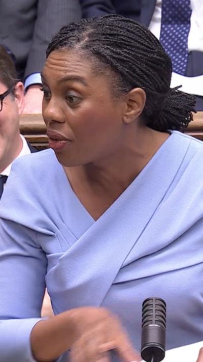 Kemi Badenoch standing in Parliament 