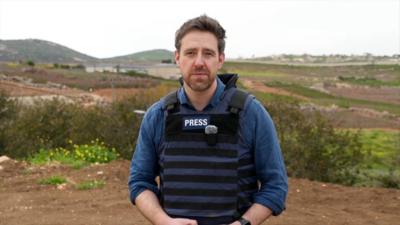 Nick Beake in a press vest in Metula.