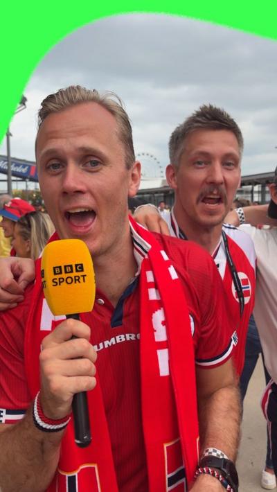 Norway fans hold bbc sport microphone
