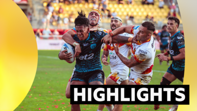 Leigh's Tesi Niu getting tackled by Catalans' Nick Cotric