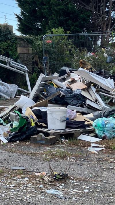 A pile of rubbish that has been fly-tipped. 