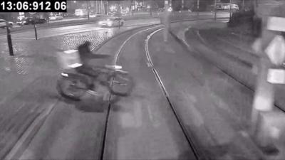 A cyclist on a tram track