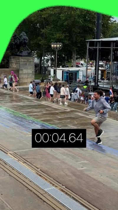 BBC reporter runs up the rocky steps