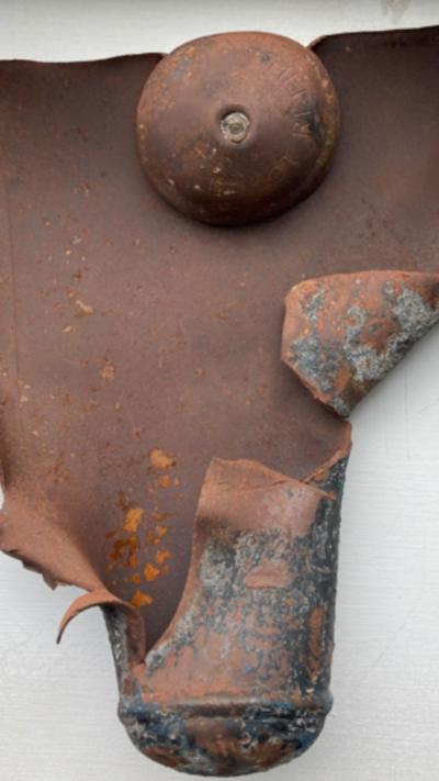 The inside of an exploded gas canister.