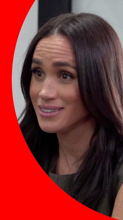 Duchess of Sussex, Meghan, sat between two students