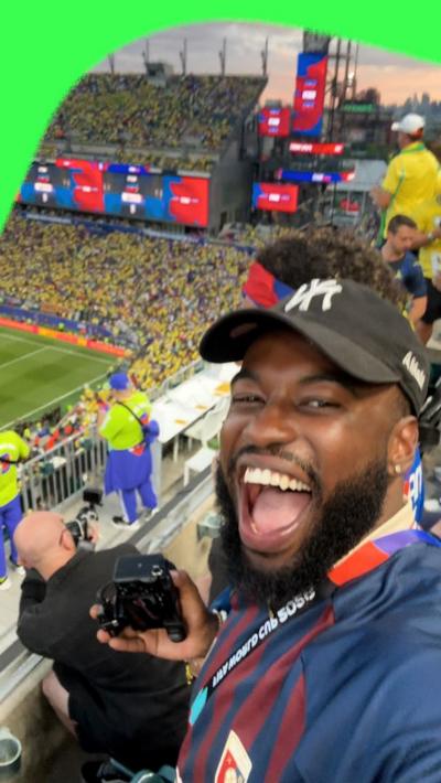 Haiti fan watches his side take on Brazil at the World Cup