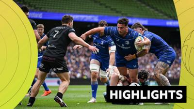 Thomas Clarkson of Leinster is tackled during the United Rugby Championship semi-final match against Glasgow Warriors at the Aviva Stadium in Dublin