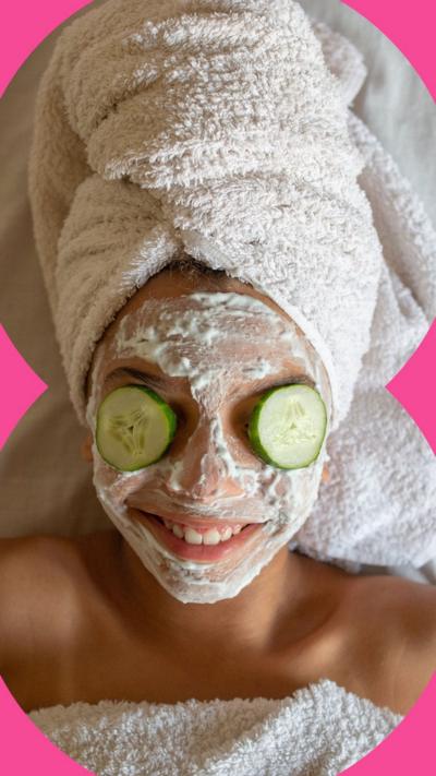 A woman with cucumber slices on her eyes 