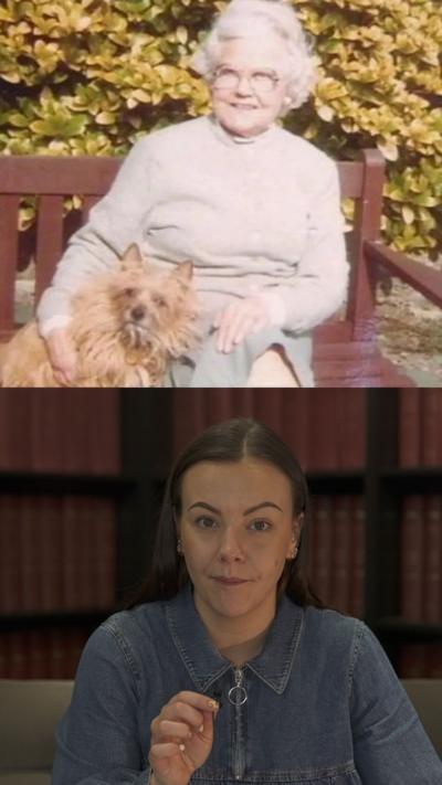 A woman holding a dog