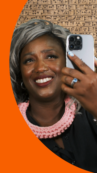 Presenter Anne-Marie Imafidon taking a selfie with her phone