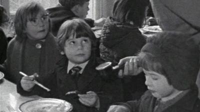 Children eating school dinner