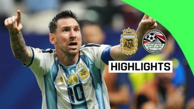 Lionel Messi points to the crowd to celebrate Argentina winning against Egypt in the 2026 World Cup knockout stages.