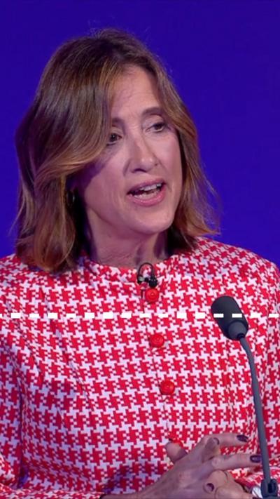 Jane Dodds in a red and white chequered top with large red buttons