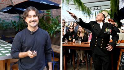 Split screen of BBC journalist in a pub garden holding a wooden paddle with two coins on it, and a man who is in a pub garden tossing two coins off a wooden paddle.