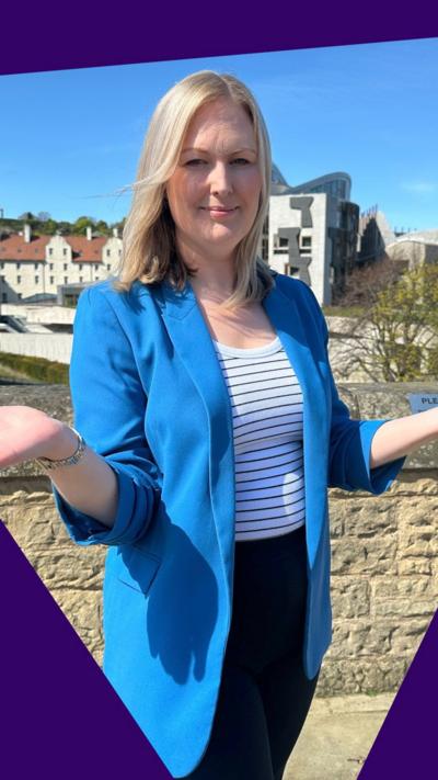 BBC's Lynsey Bews looks at the camera in an inquisitive pose with her palms facing up.