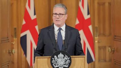 Keir Starmer standing at a lectern in downing street