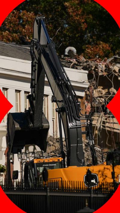 The facade of the East Wing of the White House is demolished by work crews