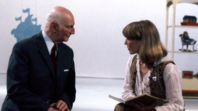 Blue Peter Presenter, Lesley Judd interviews Otto Frank in television studio