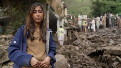 BBC reporter at the site of flash floods in Pakistan