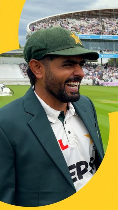 Babar Azam laughs during his pre-match interview