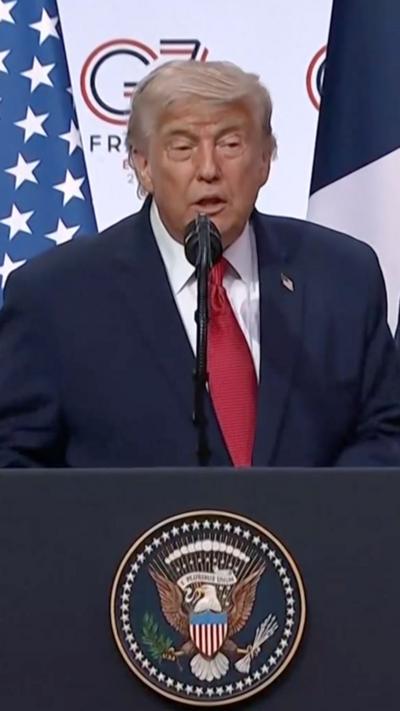 Donald Trump stood at podium