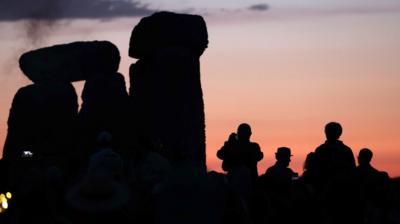 People attend the Summer Solstice at Stonehenge