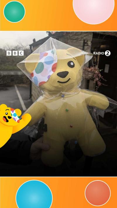 Pudsey in a rain mac