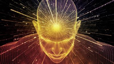 Graphical image of a human likeness with light emmanating from their head 