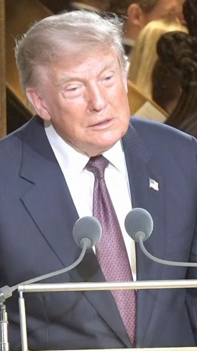 Trump delivers a speech at a lectern