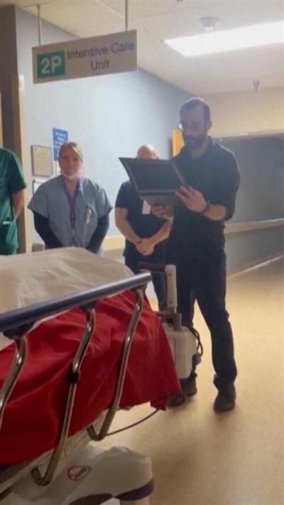 Alex Pretti honours a deceased veteran at his job as a nurse