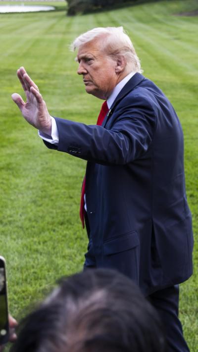 Donald Trump waves