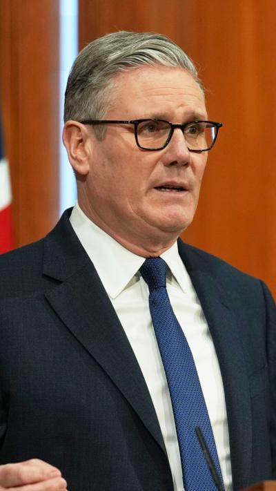 Keir Starmer wearing a suit and tie