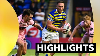 Warrington's Ben Currie evades Hull FC's Ethan O'Neill