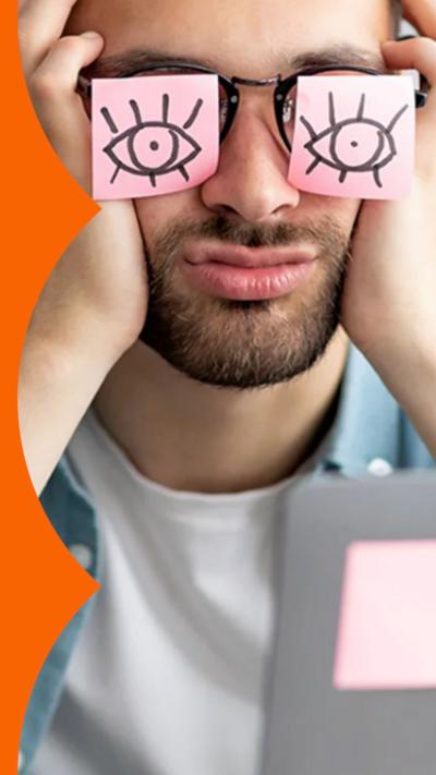 Man with post-it notes on his eyes