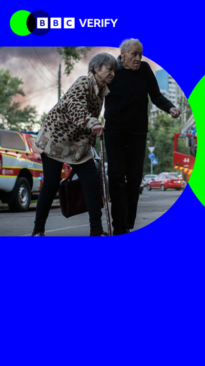 An elderly couple seek shelter after a bombing attack in Ukraine. 