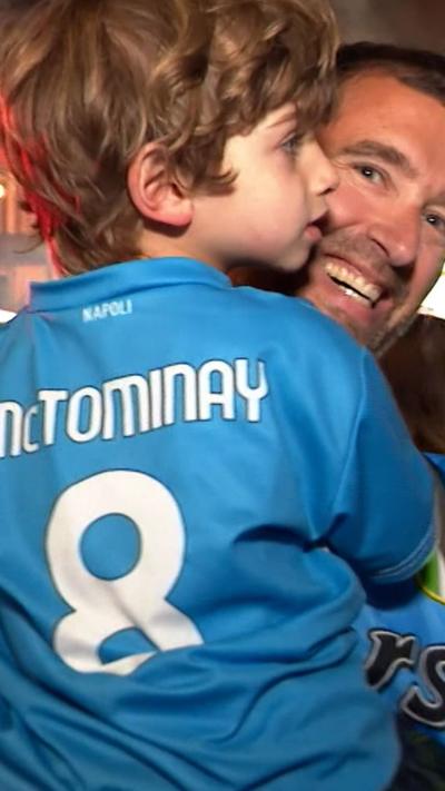 dad and kid in football top