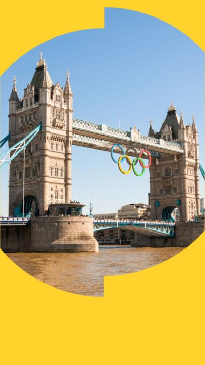 The Olympic rings hang from the middle of tower bridge in London