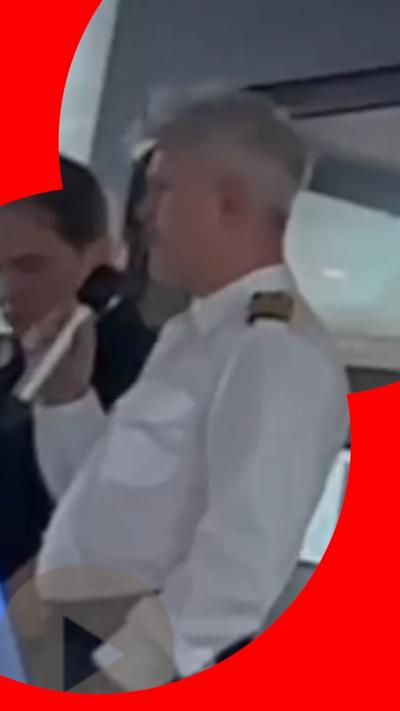 Crew member on microphone 