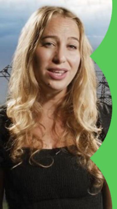 Presenter Sophia Herod with an image of pylons behind her