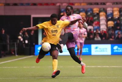 FC RTW's Michael Ndiweni (left) and MVPs United's Josh Rusoke battle for the ball during Baller League UK at the Copper Box Arena, London. Picture date: